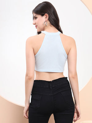 Woman wearing a light blue Skyline Asymmetry Halter Crop Top