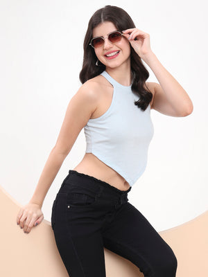 Woman wearing a light blue Skyline Asymmetry Halter Crop Top
